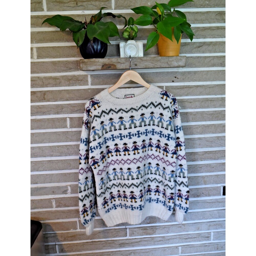 Alpaca Connection Sweater made in Peru people unique geometric holding hands